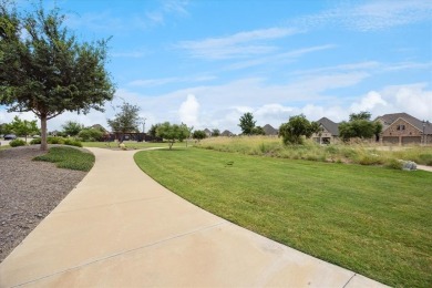 Discover luxury living in this stunning 3-bedroom, 2.5-bath home on The Tribute At the Colony in Texas - for sale on GolfHomes.com, golf home, golf lot