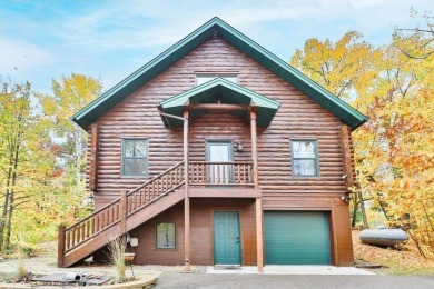 Enjoy relaxing on the large 10x30 deck overlooking the 11th hole on Hardwoods Golf Club At Mille Lacs in Minnesota - for sale on GolfHomes.com, golf home, golf lot