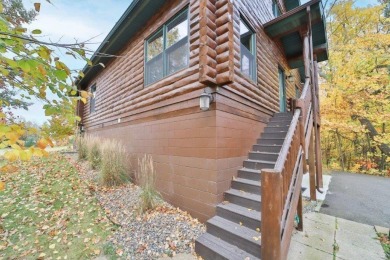 Enjoy relaxing on the large 10x30 deck overlooking the 11th hole on Hardwoods Golf Club At Mille Lacs in Minnesota - for sale on GolfHomes.com, golf home, golf lot