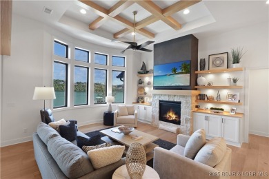 Dive into luxury at this breathtaking new build in Porto Cima on The Club At Porto Cima in Missouri - for sale on GolfHomes.com, golf home, golf lot