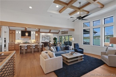 Dive into luxury at this breathtaking new build in Porto Cima on The Club At Porto Cima in Missouri - for sale on GolfHomes.com, golf home, golf lot