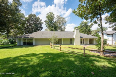 Stunning 3BR/2BA home in the desirable Tomoka Oaks community of on Tomoka Oaks Golf and Country Club in Florida - for sale on GolfHomes.com, golf home, golf lot