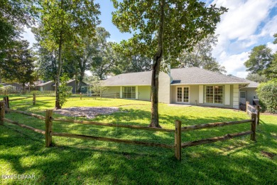 Stunning 3BR/2BA home in the desirable Tomoka Oaks community of on Tomoka Oaks Golf and Country Club in Florida - for sale on GolfHomes.com, golf home, golf lot