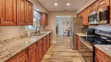 Welcome home to this tastefully updated and well-maintained on Lansbrook Golf Club in Florida - for sale on GolfHomes.com, golf home, golf lot