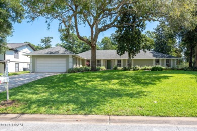 Stunning 3BR/2BA home in the desirable Tomoka Oaks community of on Tomoka Oaks Golf and Country Club in Florida - for sale on GolfHomes.com, golf home, golf lot