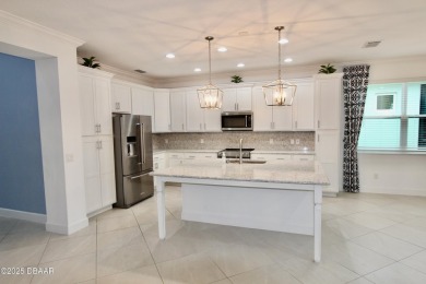 IMMEDIATE MOVE IN READY HOME! Put your TOES IN THE SAND in the on LPGA International Golf Course in Florida - for sale on GolfHomes.com, golf home, golf lot