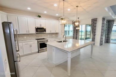 IMMEDIATE MOVE IN READY HOME! Put your TOES IN THE SAND in the on LPGA International Golf Course in Florida - for sale on GolfHomes.com, golf home, golf lot