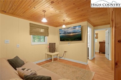 Escape the summer heat and discover your perfect mountain on Beech Mountain Club in North Carolina - for sale on GolfHomes.com, golf home, golf lot
