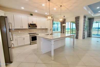 IMMEDIATE MOVE IN READY HOME! Put your TOES IN THE SAND in the on LPGA International Golf Course in Florida - for sale on GolfHomes.com, golf home, golf lot