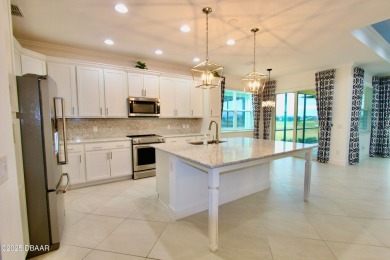 IMMEDIATE MOVE IN READY HOME! Put your TOES IN THE SAND in the on LPGA International Golf Course in Florida - for sale on GolfHomes.com, golf home, golf lot