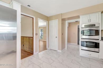 Stunning 3BR/2BA home in the desirable Tomoka Oaks community of on Tomoka Oaks Golf and Country Club in Florida - for sale on GolfHomes.com, golf home, golf lot