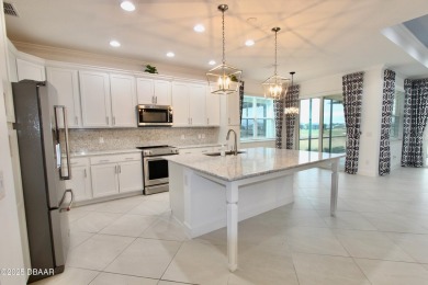 IMMEDIATE MOVE IN READY HOME! Put your TOES IN THE SAND in the on LPGA International Golf Course in Florida - for sale on GolfHomes.com, golf home, golf lot