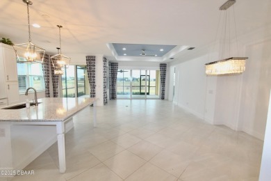 IMMEDIATE MOVE IN READY HOME! Put your TOES IN THE SAND in the on LPGA International Golf Course in Florida - for sale on GolfHomes.com, golf home, golf lot