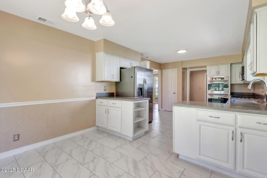 Stunning 3BR/2BA home in the desirable Tomoka Oaks community of on Tomoka Oaks Golf and Country Club in Florida - for sale on GolfHomes.com, golf home, golf lot