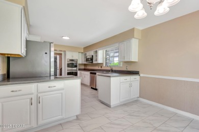 Stunning 3BR/2BA home in the desirable Tomoka Oaks community of on Tomoka Oaks Golf and Country Club in Florida - for sale on GolfHomes.com, golf home, golf lot