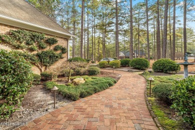 Located just inside Pinewild Country Club, this all brick on Pinewild Country Club of Pinehurst in North Carolina - for sale on GolfHomes.com, golf home, golf lot