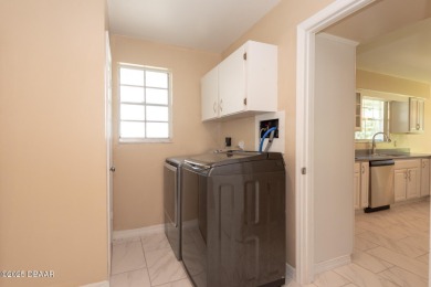 Stunning 3BR/2BA home in the desirable Tomoka Oaks community of on Tomoka Oaks Golf and Country Club in Florida - for sale on GolfHomes.com, golf home, golf lot