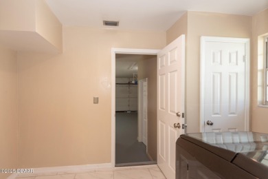 Stunning 3BR/2BA home in the desirable Tomoka Oaks community of on Tomoka Oaks Golf and Country Club in Florida - for sale on GolfHomes.com, golf home, golf lot