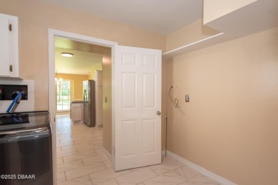 Stunning 3BR/2BA home in the desirable Tomoka Oaks community of on Tomoka Oaks Golf and Country Club in Florida - for sale on GolfHomes.com, golf home, golf lot