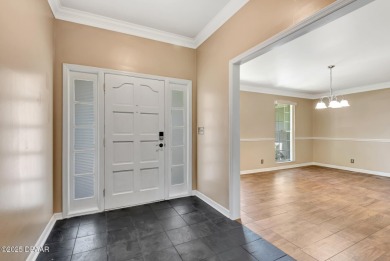 Stunning 3BR/2BA home in the desirable Tomoka Oaks community of on Tomoka Oaks Golf and Country Club in Florida - for sale on GolfHomes.com, golf home, golf lot