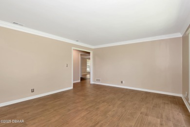 Stunning 3BR/2BA home in the desirable Tomoka Oaks community of on Tomoka Oaks Golf and Country Club in Florida - for sale on GolfHomes.com, golf home, golf lot