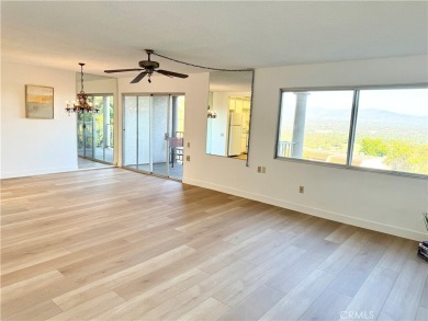 OUTSTANDING VIEW of the Saddleback Mountain, City Lights, and on Leisure Village Par 3 Golf Course in California - for sale on GolfHomes.com, golf home, golf lot