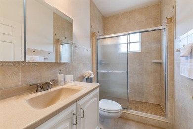 Experience the ultimate Doral lifestyle in this stunning 5BR/3BA on Jim McLean Signature Course in Florida - for sale on GolfHomes.com, golf home, golf lot