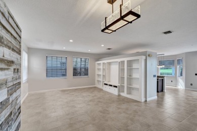 Located on a quiet, tree-lined street and surrounded by lush on The Links At Madison Green in Florida - for sale on GolfHomes.com, golf home, golf lot