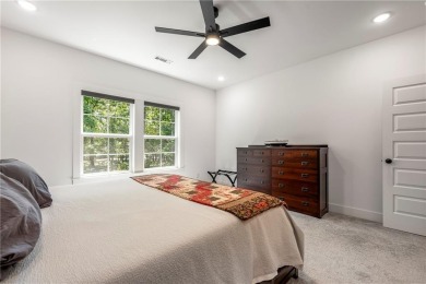 Built in 2024, this home sits on .29 acre lot minutes from I49 on Bella Vista Country Club - Highlands in Arkansas - for sale on GolfHomes.com, golf home, golf lot