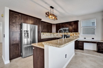 Located on a quiet, tree-lined street and surrounded by lush on The Links At Madison Green in Florida - for sale on GolfHomes.com, golf home, golf lot