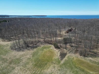 Envision your dream home nestled amidst the serene beauty of the on Garden Golf Course in Michigan - for sale on GolfHomes.com, golf home, golf lot