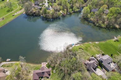 This exceptional parcel of land is situated within the highly on Foxcliff Golf Club in Indiana - for sale on GolfHomes.com, golf home, golf lot