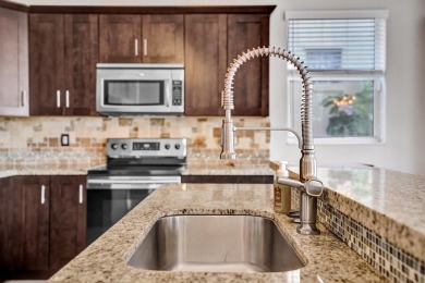 Located on a quiet, tree-lined street and surrounded by lush on The Links At Madison Green in Florida - for sale on GolfHomes.com, golf home, golf lot