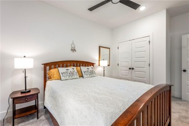 Built in 2024, this home sits on .29 acre lot minutes from I49 on Bella Vista Country Club - Highlands in Arkansas - for sale on GolfHomes.com, golf home, golf lot