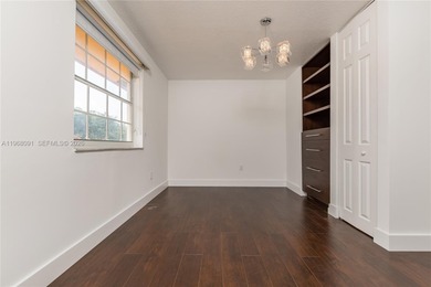 Experience the ultimate Doral lifestyle in this stunning 5BR/3BA on Jim McLean Signature Course in Florida - for sale on GolfHomes.com, golf home, golf lot