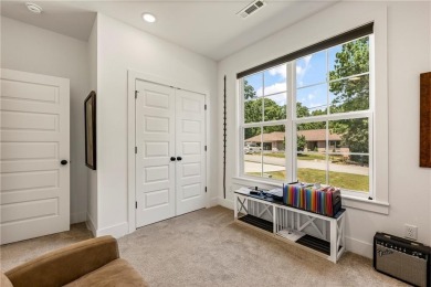 Built in 2024, this home sits on .29 acre lot minutes from I49 on Bella Vista Country Club - Highlands in Arkansas - for sale on GolfHomes.com, golf home, golf lot