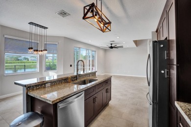 Located on a quiet, tree-lined street and surrounded by lush on The Links At Madison Green in Florida - for sale on GolfHomes.com, golf home, golf lot