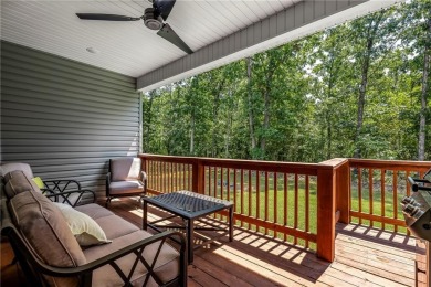 Built in 2024, this home sits on .29 acre lot minutes from I49 on Bella Vista Country Club - Highlands in Arkansas - for sale on GolfHomes.com, golf home, golf lot