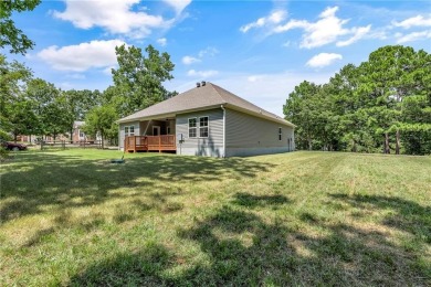 Built in 2024, this home sits on .29 acre lot minutes from I49 on Bella Vista Country Club - Highlands in Arkansas - for sale on GolfHomes.com, golf home, golf lot