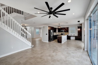 Located on a quiet, tree-lined street and surrounded by lush on The Links At Madison Green in Florida - for sale on GolfHomes.com, golf home, golf lot