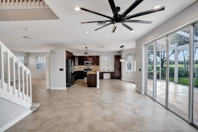 Located on a quiet, tree-lined street and surrounded by lush on The Links At Madison Green in Florida - for sale on GolfHomes.com, golf home, golf lot