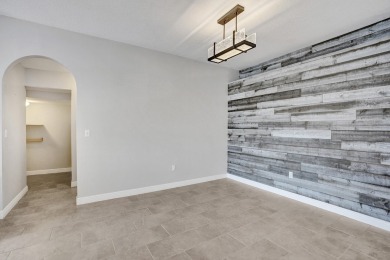 Located on a quiet, tree-lined street and surrounded by lush on The Links At Madison Green in Florida - for sale on GolfHomes.com, golf home, golf lot