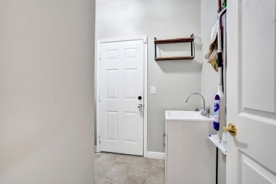 Located on a quiet, tree-lined street and surrounded by lush on The Links At Madison Green in Florida - for sale on GolfHomes.com, golf home, golf lot