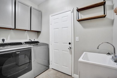 Located on a quiet, tree-lined street and surrounded by lush on The Links At Madison Green in Florida - for sale on GolfHomes.com, golf home, golf lot
