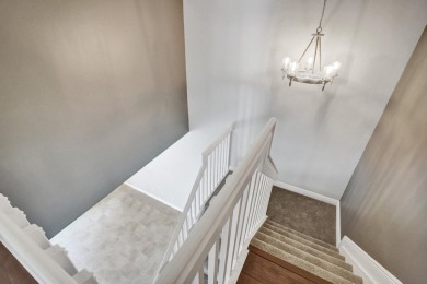 Located on a quiet, tree-lined street and surrounded by lush on The Links At Madison Green in Florida - for sale on GolfHomes.com, golf home, golf lot