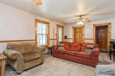 This delightful two-story, 3-bedroom, 2-bathroom home has been on Cedardell Golf Club in Illinois - for sale on GolfHomes.com, golf home, golf lot