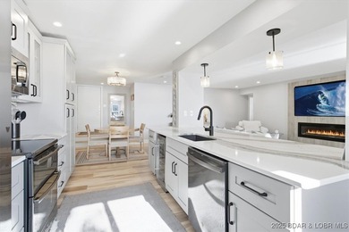 This truly spectacular Walk-in level Waterfront condo. Has on Seasons Ridge At Four Seasons in Missouri - for sale on GolfHomes.com, golf home, golf lot