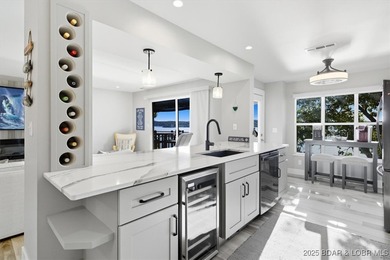This truly spectacular Walk-in level Waterfront condo. Has on Seasons Ridge At Four Seasons in Missouri - for sale on GolfHomes.com, golf home, golf lot