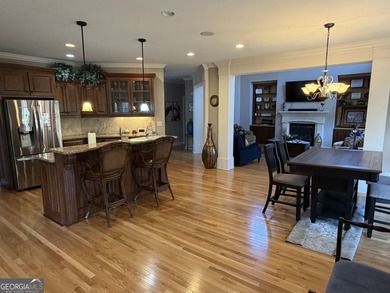 Beautifully positioned on the golf course, this four-sided brick on Canongate At Heron Bay in Georgia - for sale on GolfHomes.com, golf home, golf lot