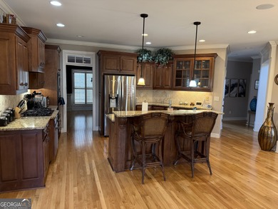 Beautifully positioned on the golf course, this four-sided brick on Canongate At Heron Bay in Georgia - for sale on GolfHomes.com, golf home, golf lot